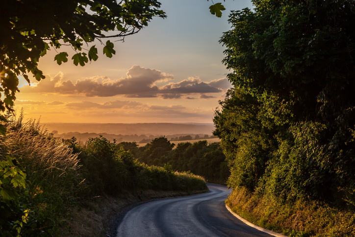 Curvy road in sunset.